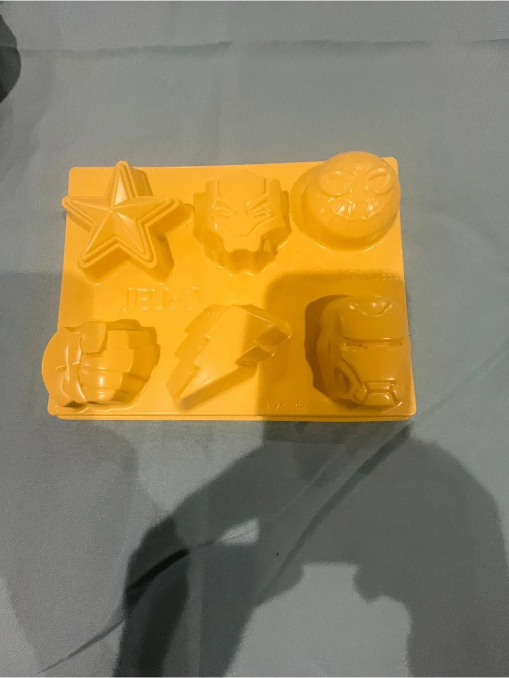 Silicone Football and 2 superhero molds set of 3 items
